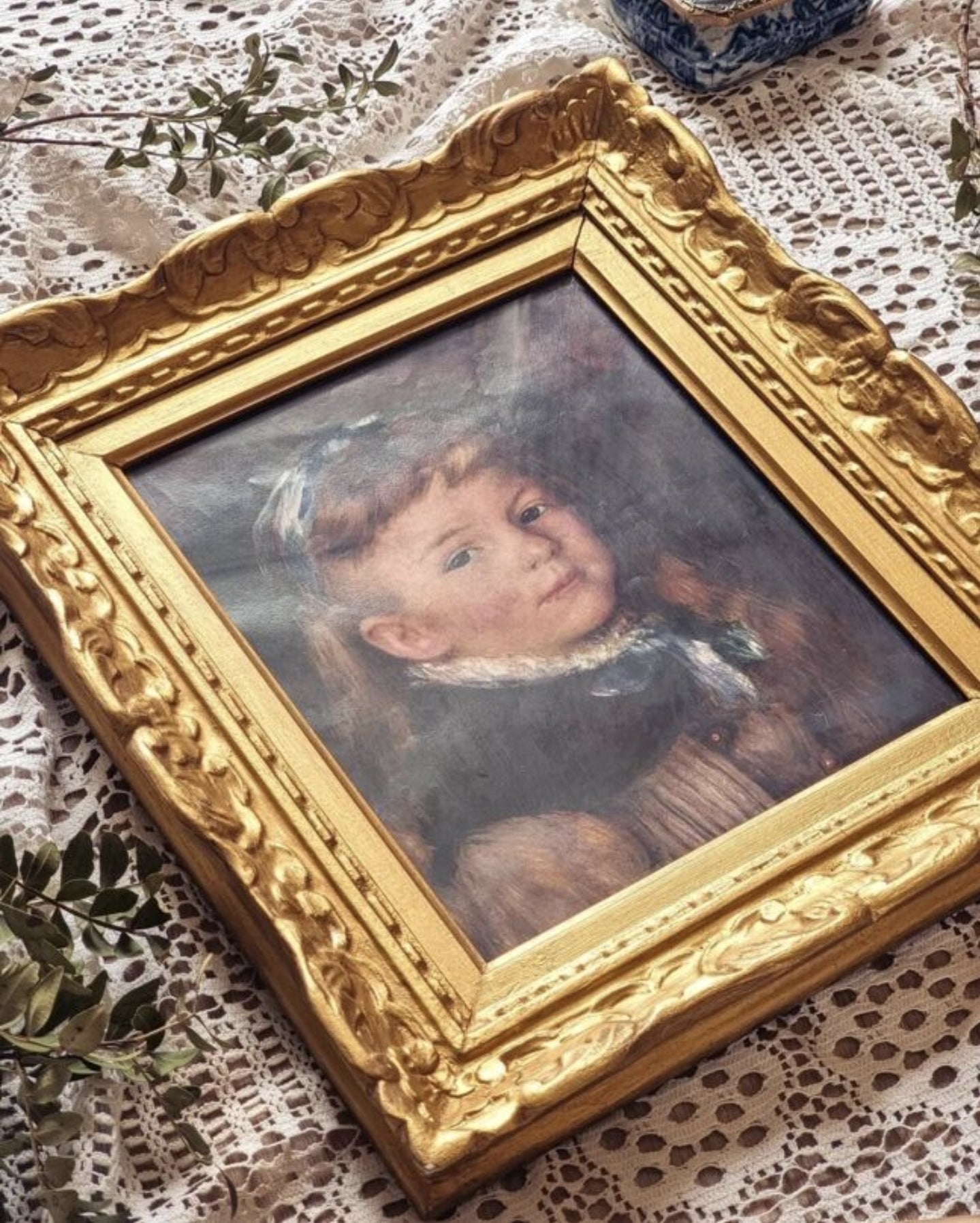 Cadre baroque et sa reproduction de Renoir