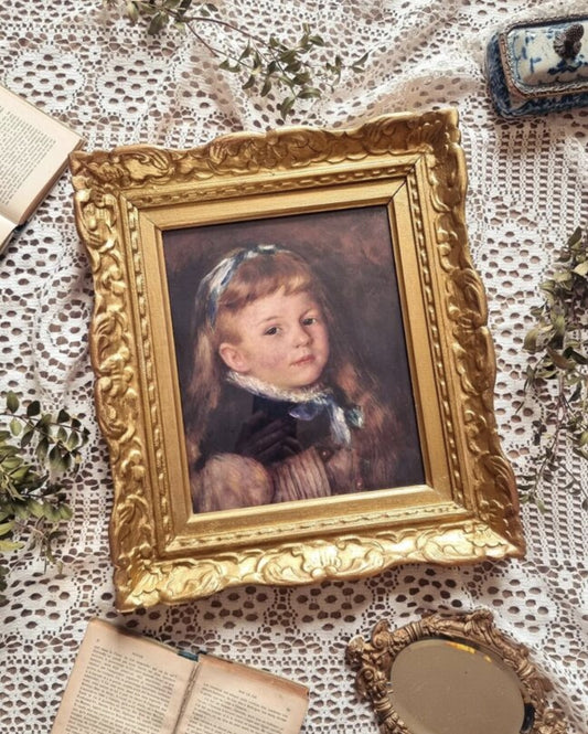 Cadre baroque et sa reproduction de Renoir
